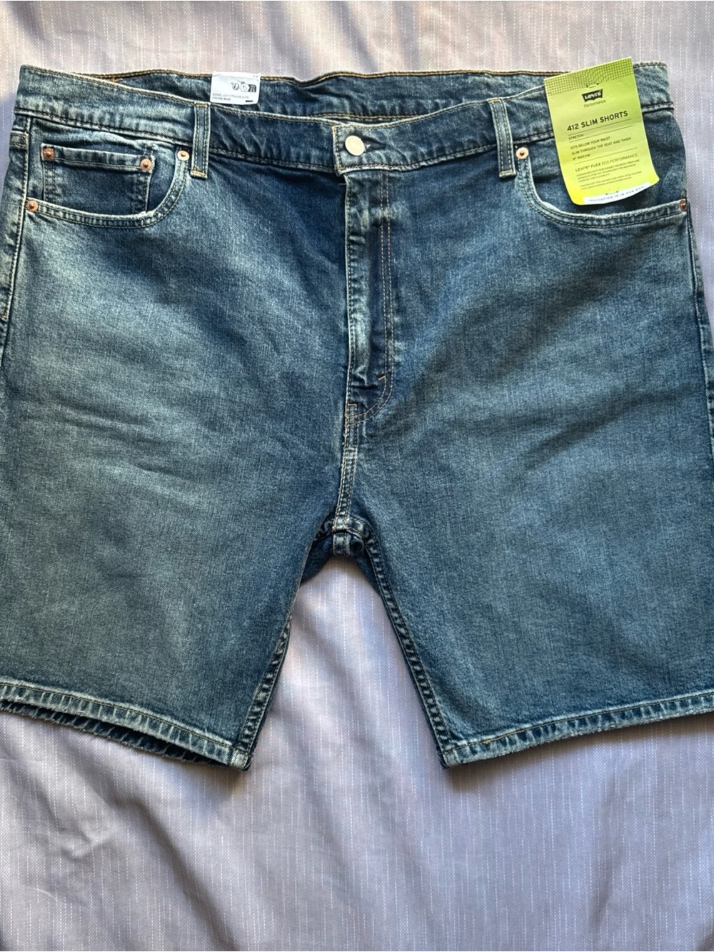 Levi's 412 Slim Jean Shorts in Washed Blue Denim